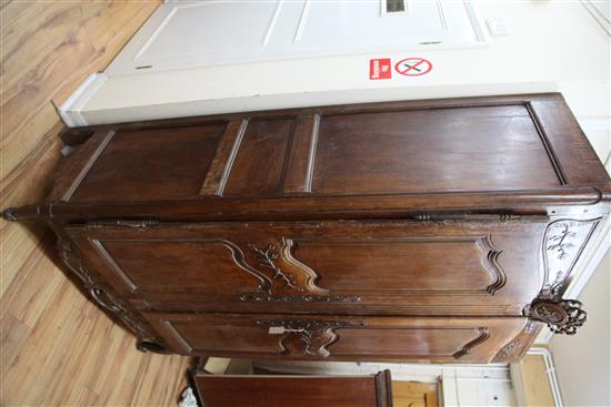 A large 19th century French walnut armoire, H.7ft 9in. W.5ft